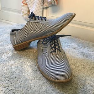 Blue striped oxford style flats